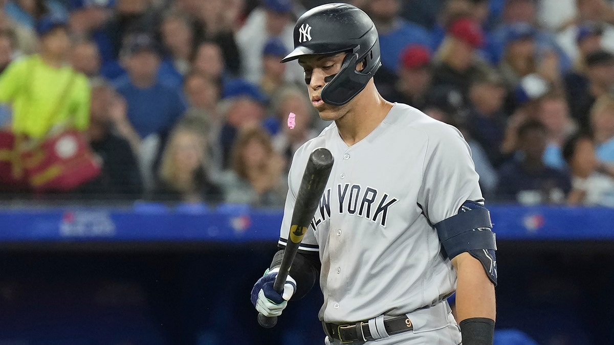 Aaron Judge walks to the dugout