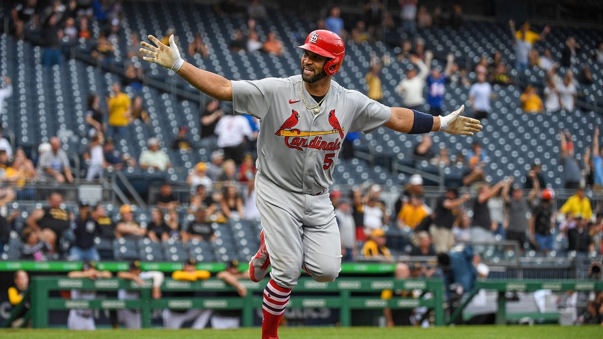 Albert Pujols runs down first base line