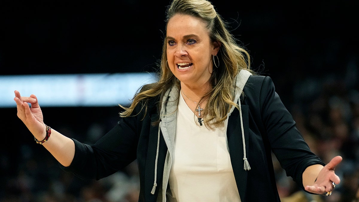 Becky Hammon coaches the Aces