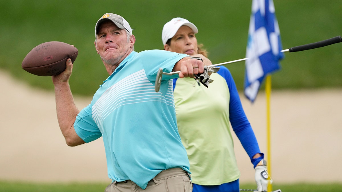 Brett Favre throwing a football in June 2022 