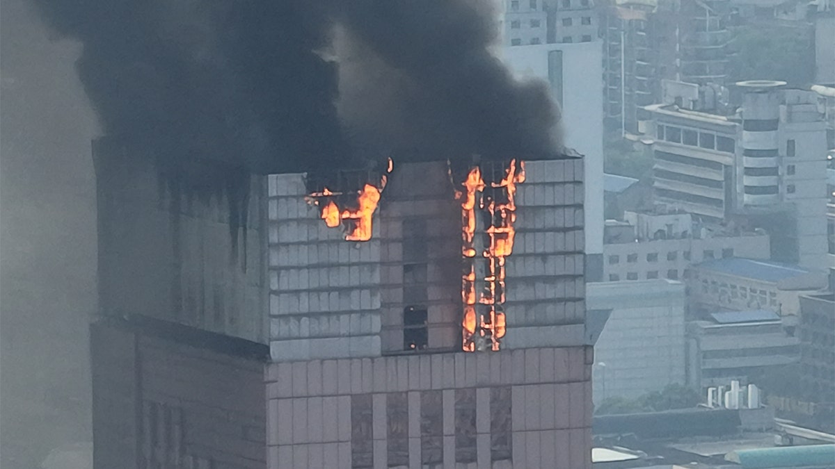Chinese skyscraper erupts in flames