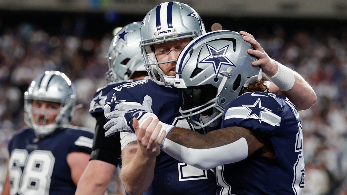 Cooper Rush and Ezekiel Elliott