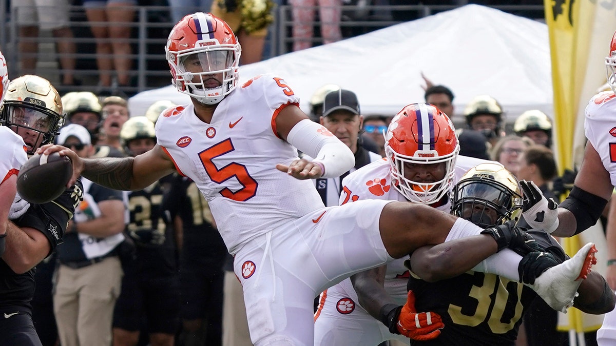 DJ Uiagalelei caught by a Wake Forest defender