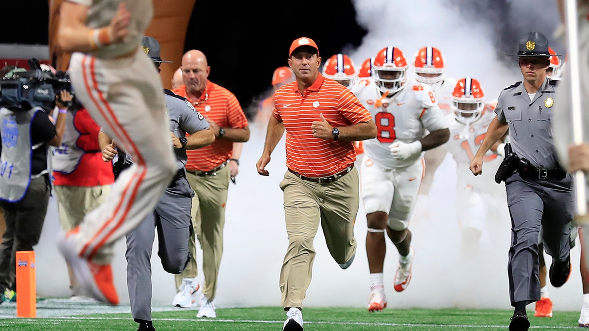 Clemson coach Dabo Swinney leads the team