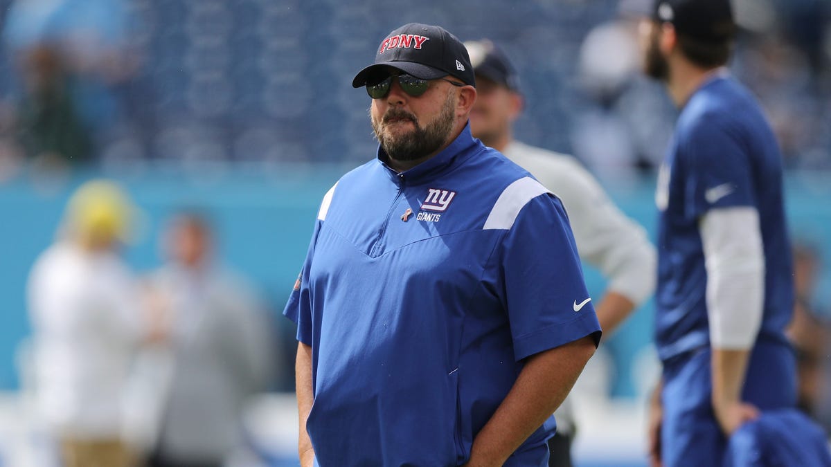 Brian Daboll with FDNY hat on