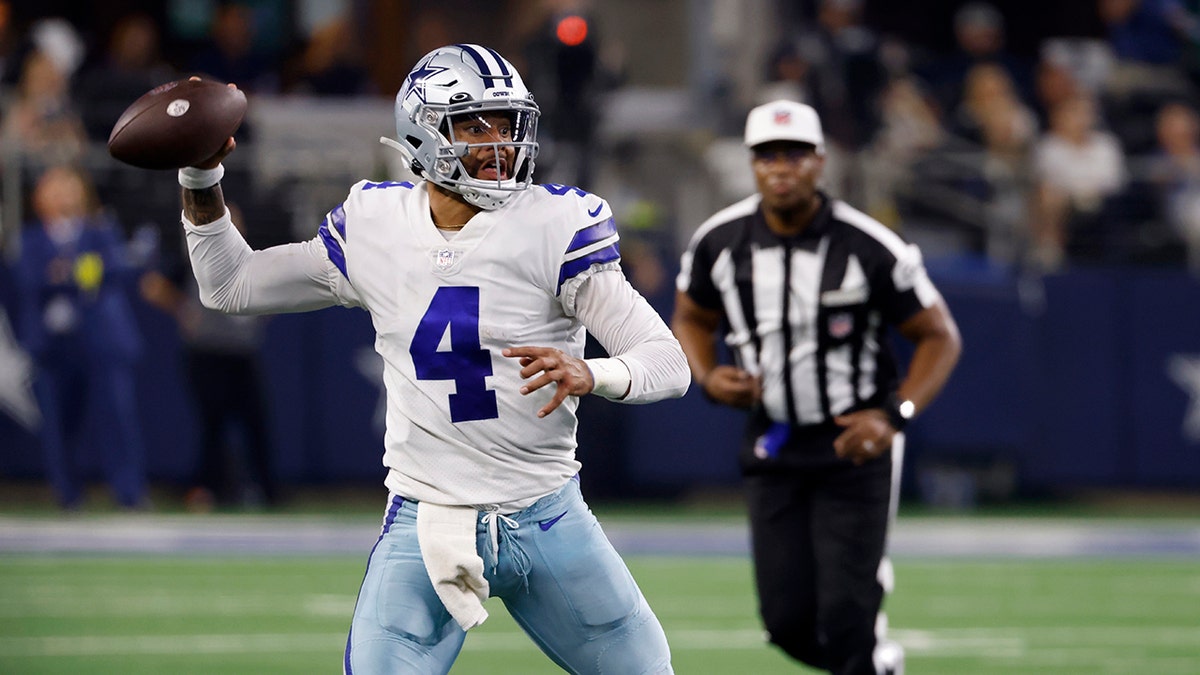 Dak Prescott looks to throw