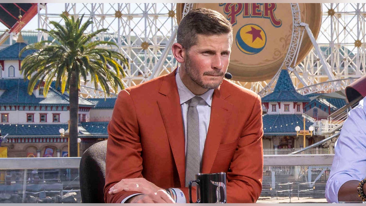 Dan Orlovsky looks on