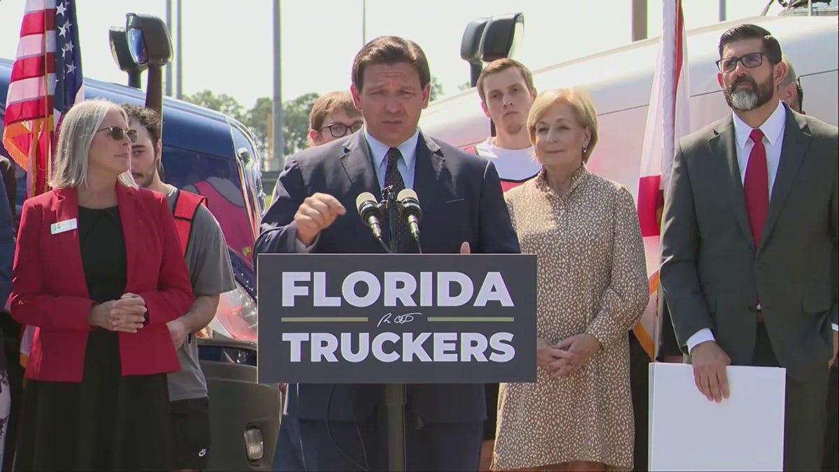 Florida Gov. Ron DeSantis talks to press