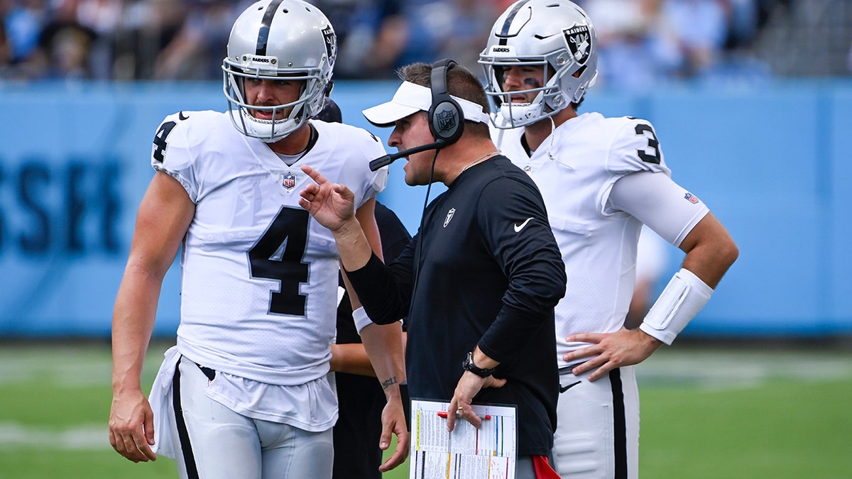 Derek Carr and Josh McDaniels