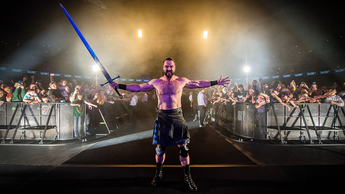 Drew McIntyre holds his sword