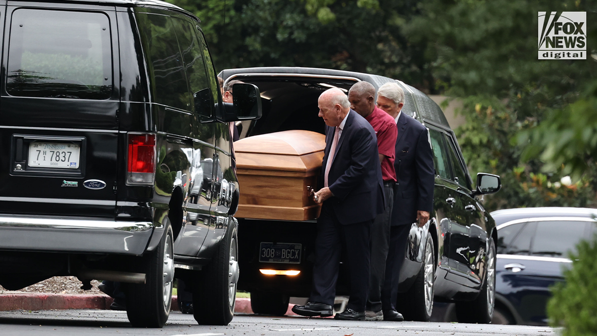 Eliza Fletcher casket being carried