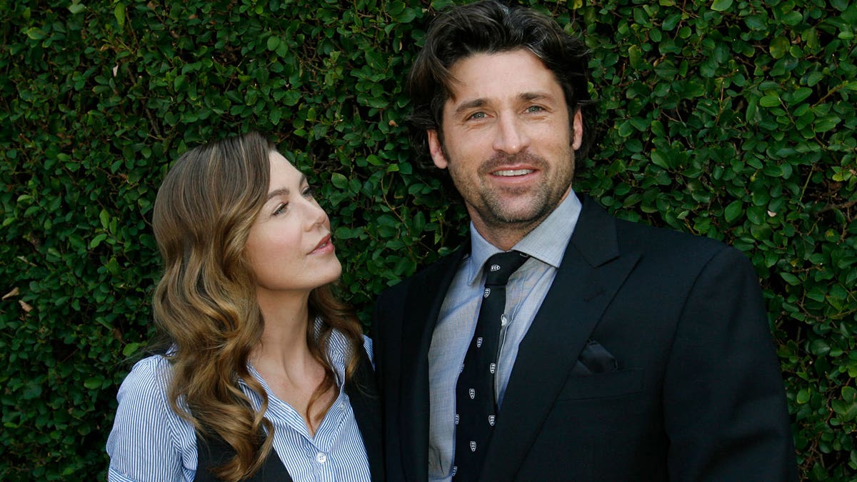 Ellen Pompeo and Patrick Dempsey pose for a photo