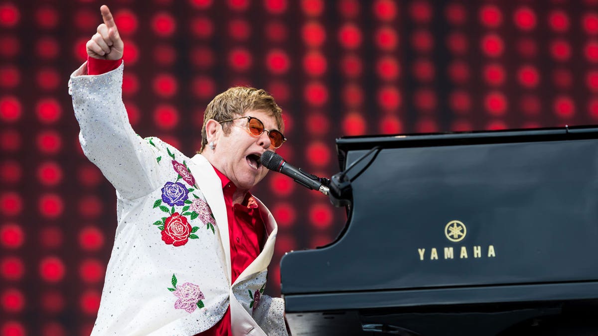 Elton John performs
