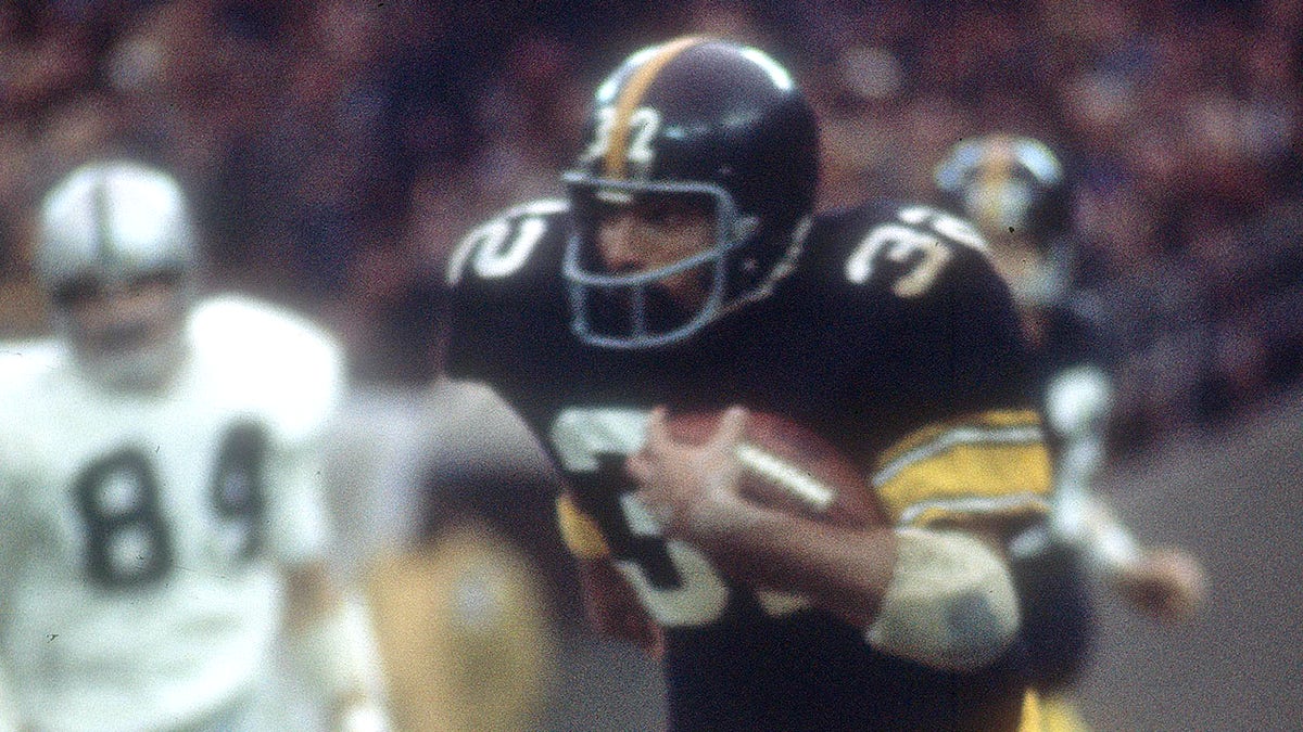 Franco Harris running with ball