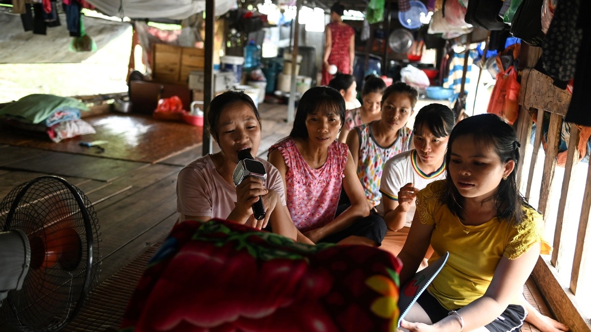 Vietnamese workers singing karaoke