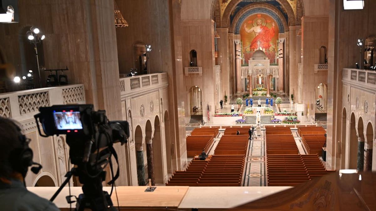 Empty pews at the Basilica of the National Shrine of the Immaculate Conception
