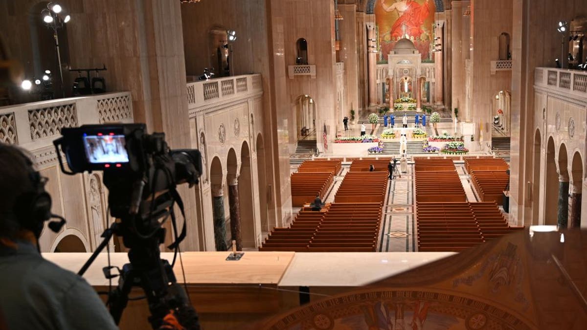 Empty pews at the Basilica of the National Shrine of the Immaculate Conception