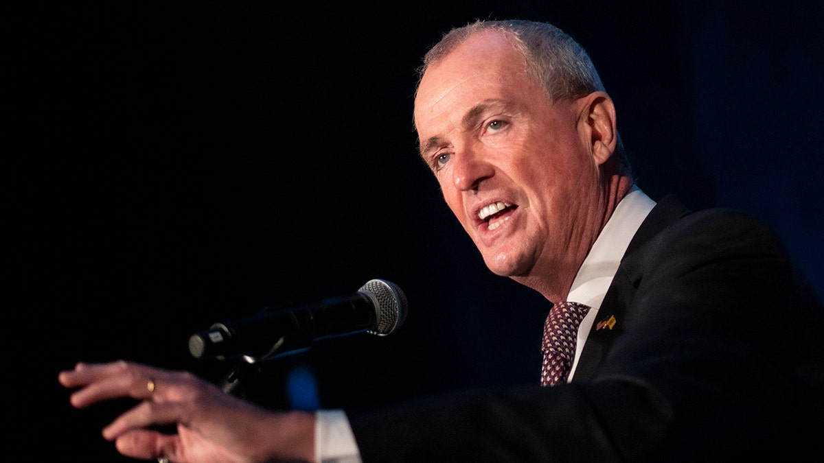 Phil Murphy at microphone