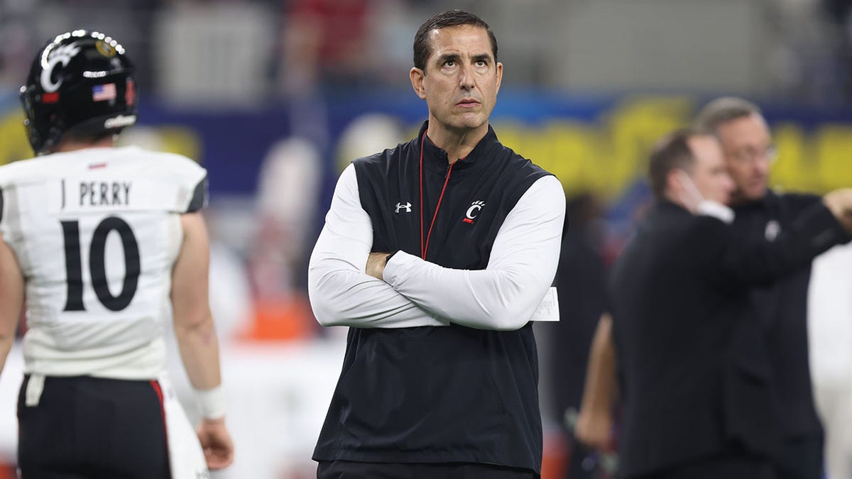 Luke Fickell looks on against Alabama