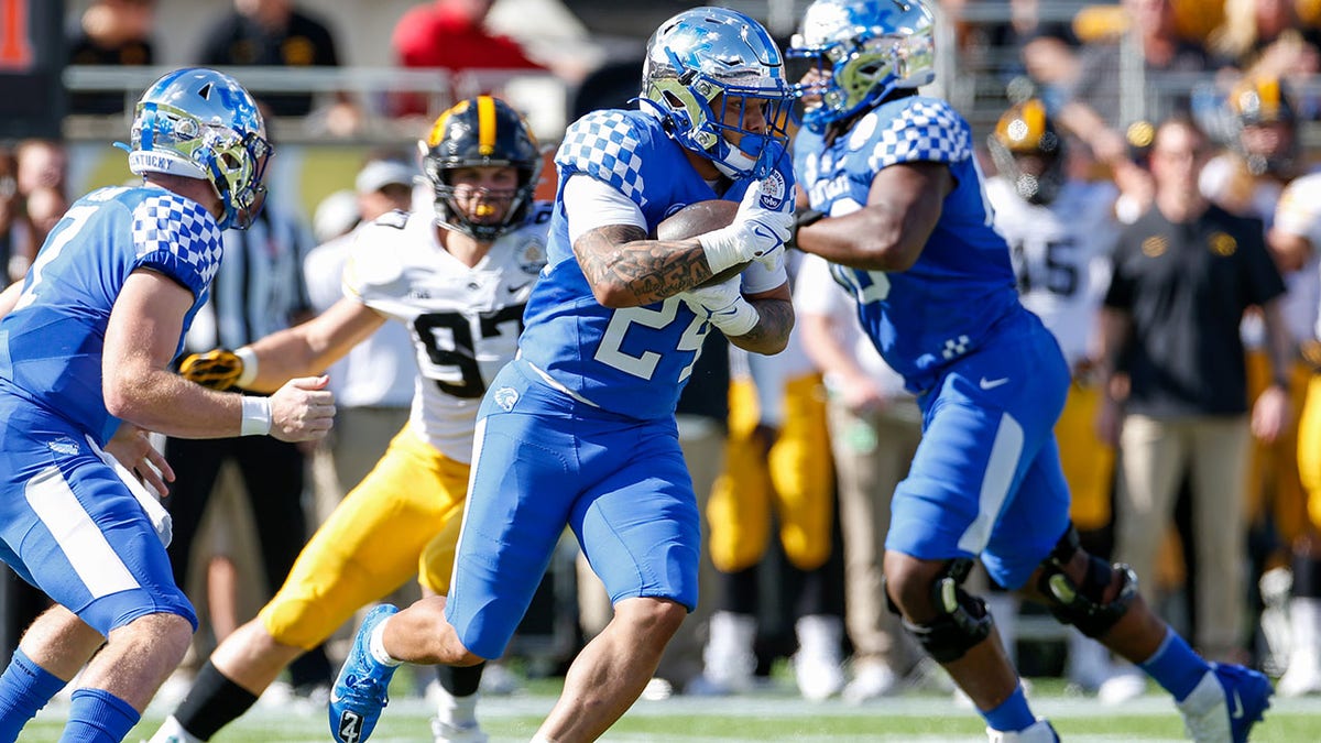 Kentucky Wildcats running back Chris Rodriguez Jr. against the Iowa Hawkeys