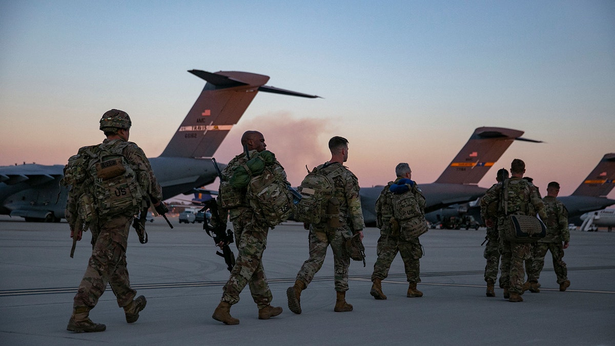 Fort Bragg soldiers head to plane