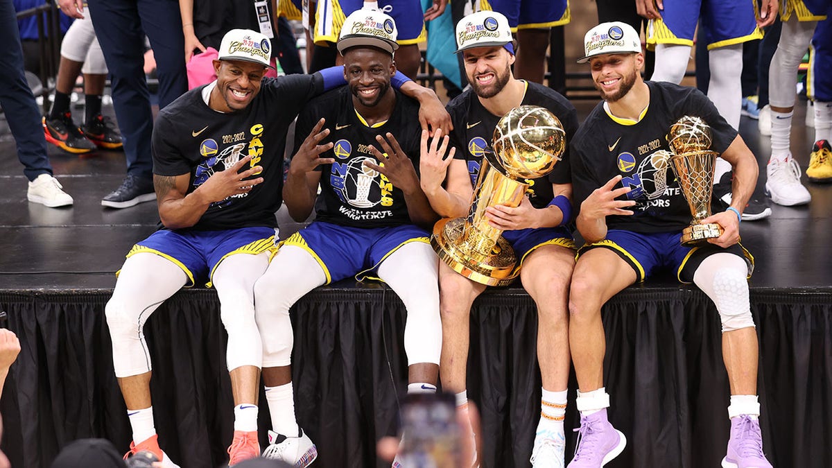 Andre Iguodala celebrates with teammates after winning the NBA finals