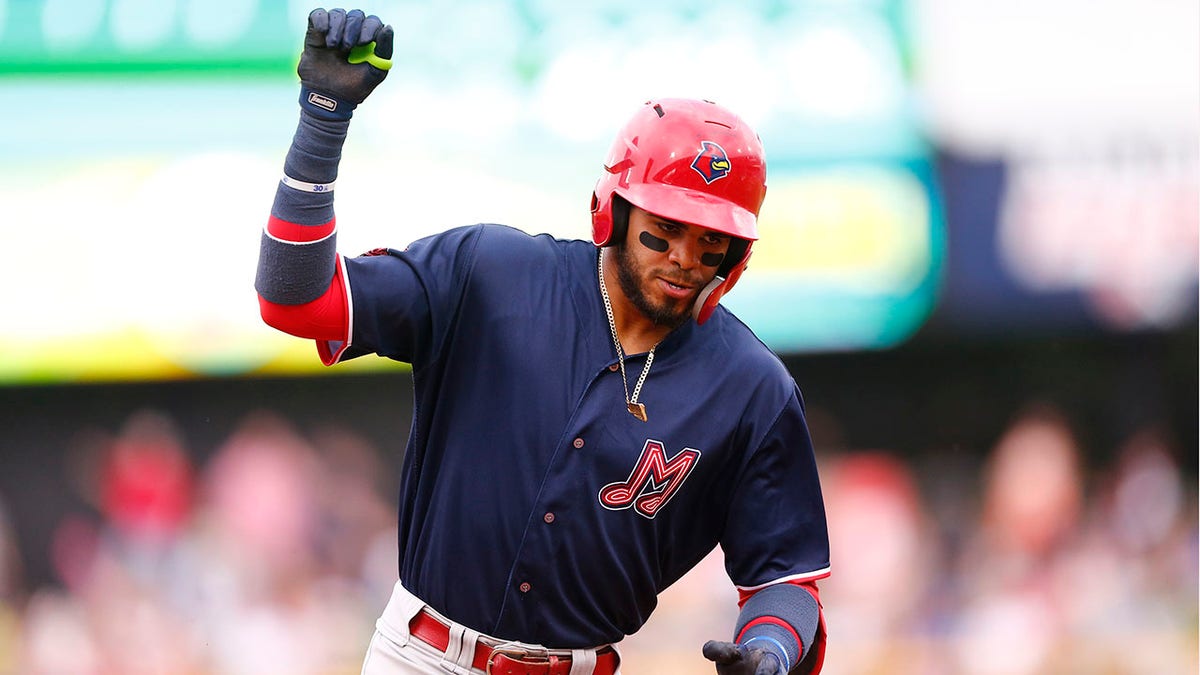 Redbirds infielder Delvin Perez rounds the bases