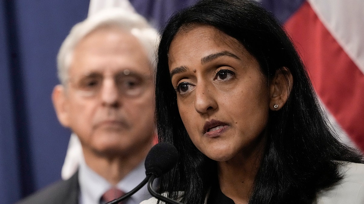 Associate Attorney General Vanita Gupta speaks into microphone