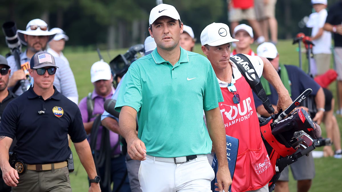 Scottie Scheffler plays during the final round of the PGA Tour Championship