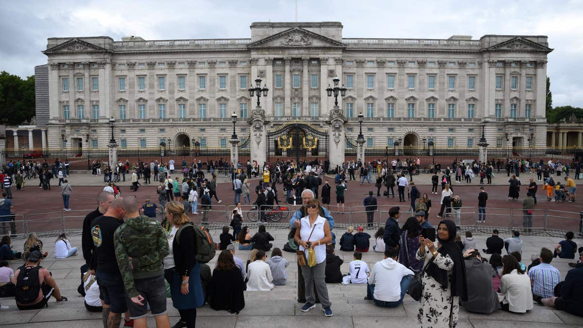 People outside of Buckingham Palace worried about Queen Elizabeth II