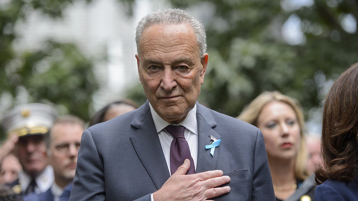 Schumer at 9/11 memorial with hand over heart