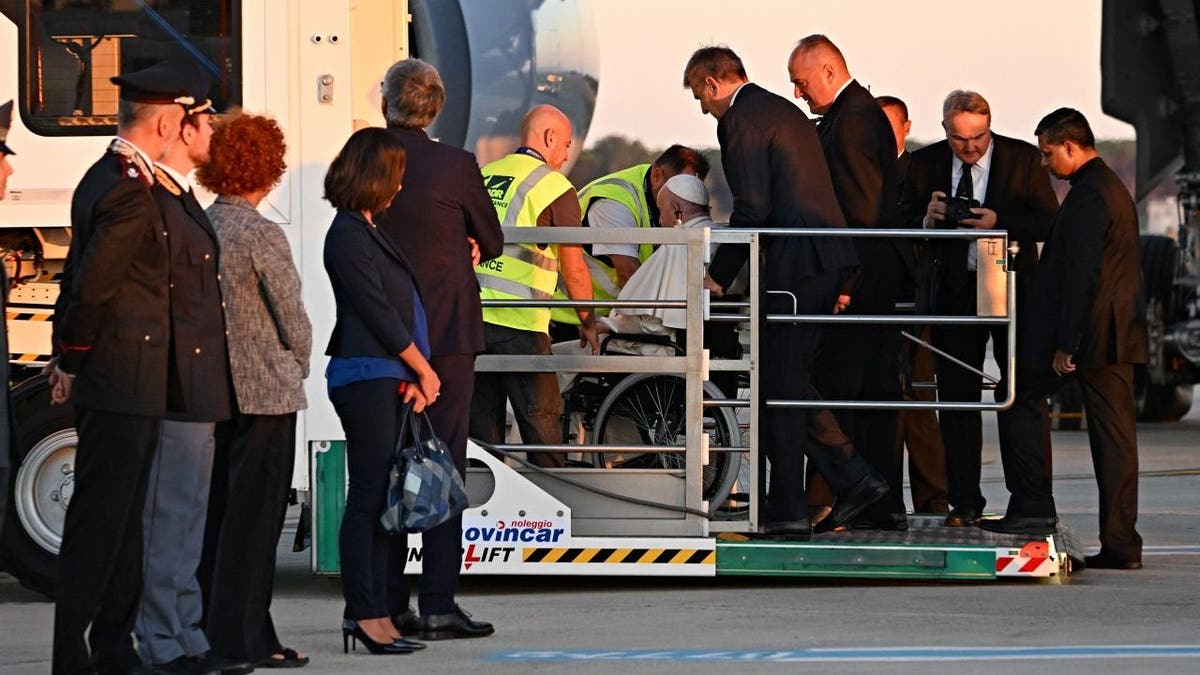 Pope Francis boards plane in wheelchair ahead of Kazakhstan trip