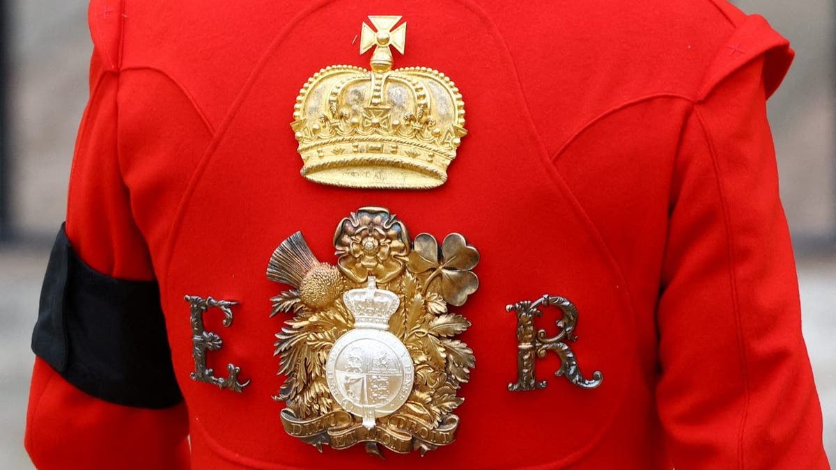 Queen Elizabeth II's royal cypher on a guard's uniform