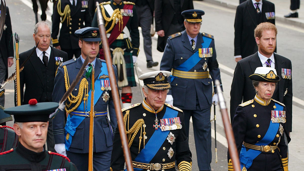 King Charles leads royals in procession of queen's coffin