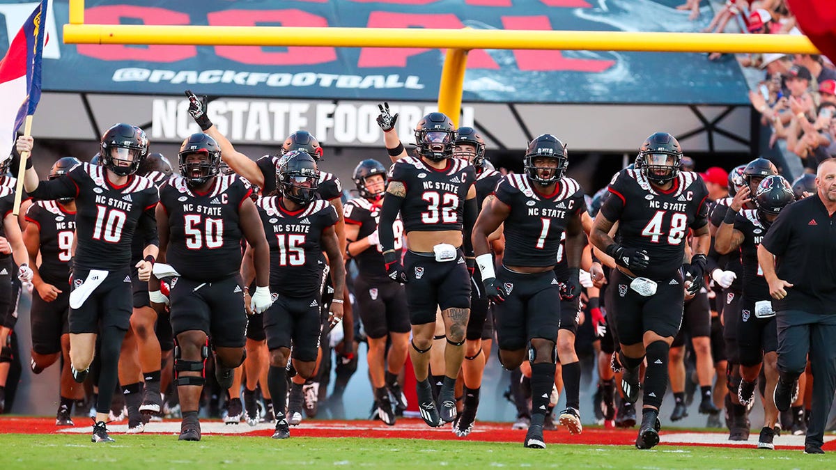 NC State run onto the field against Texas Tech