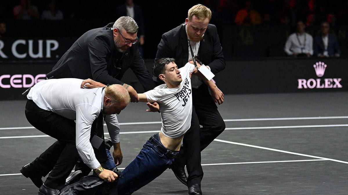 Laver Cup 2022 Climate change protester storms the court, lights arm on fire Fox News