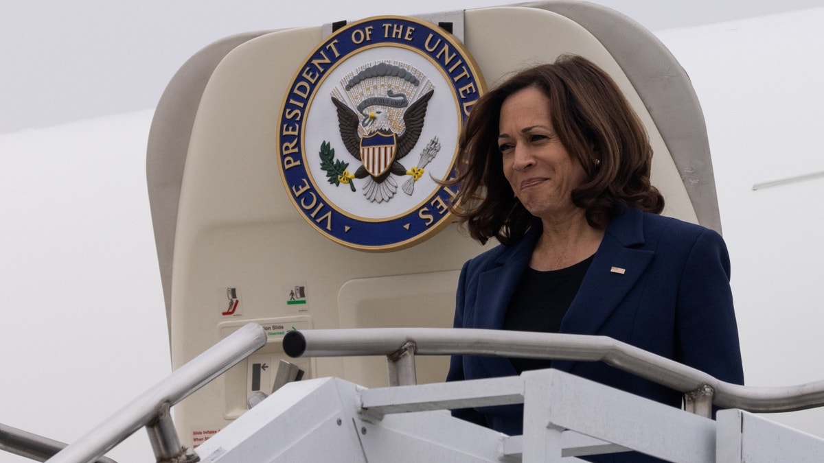 Kamala Harris walking off plane