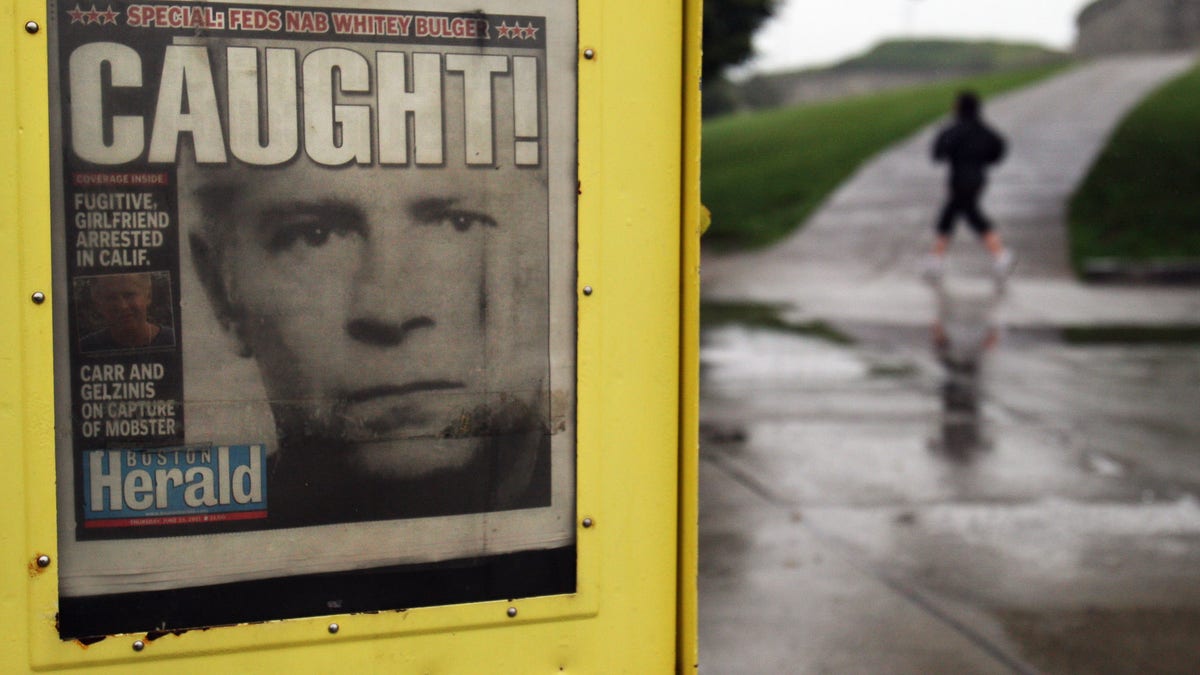 A newspaper on display showing Whitey Bulger caught