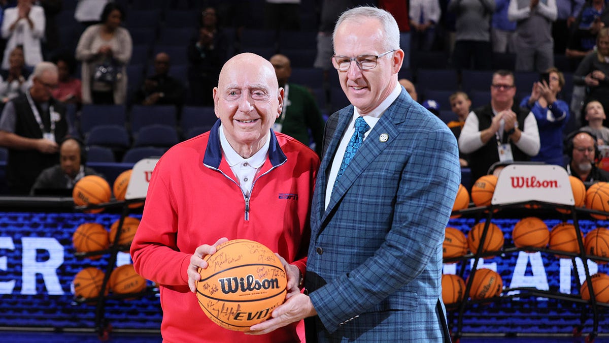 SEC commissioner Greg Sankey with Dick Vitale