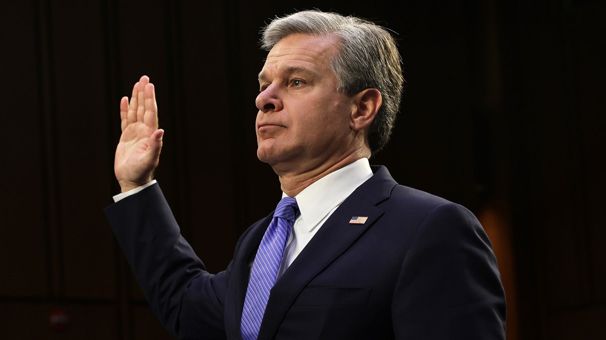 Christopher Wray swearing in to the committee