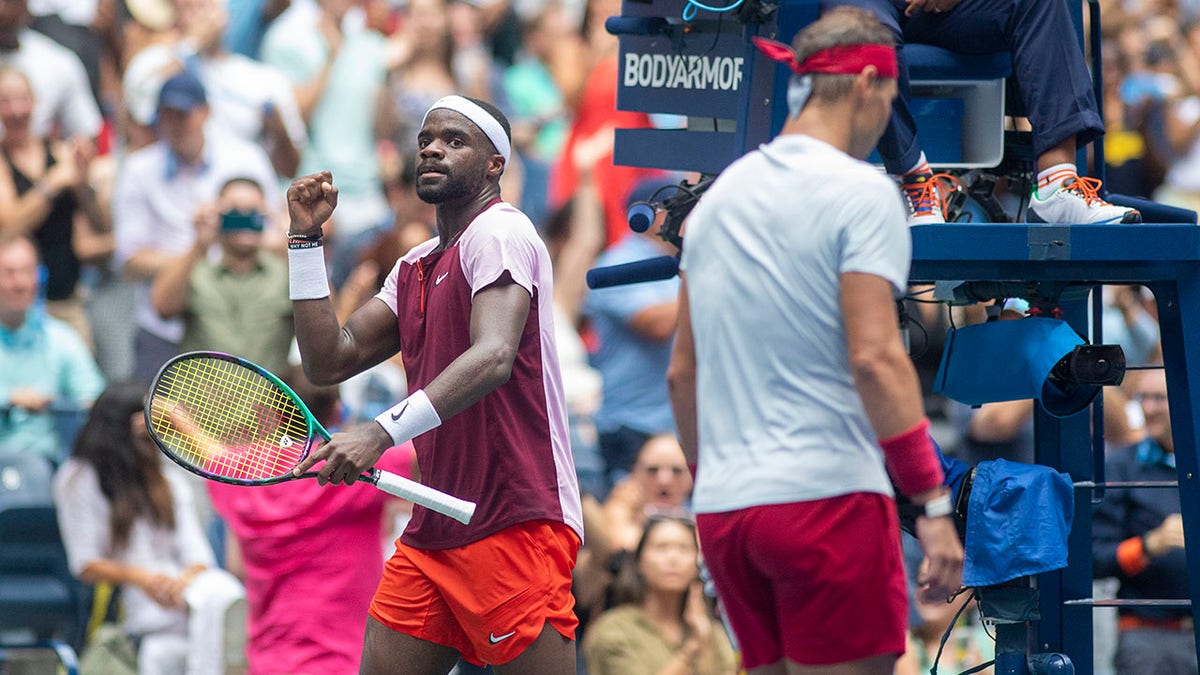 Frances Tiafoe celebrates