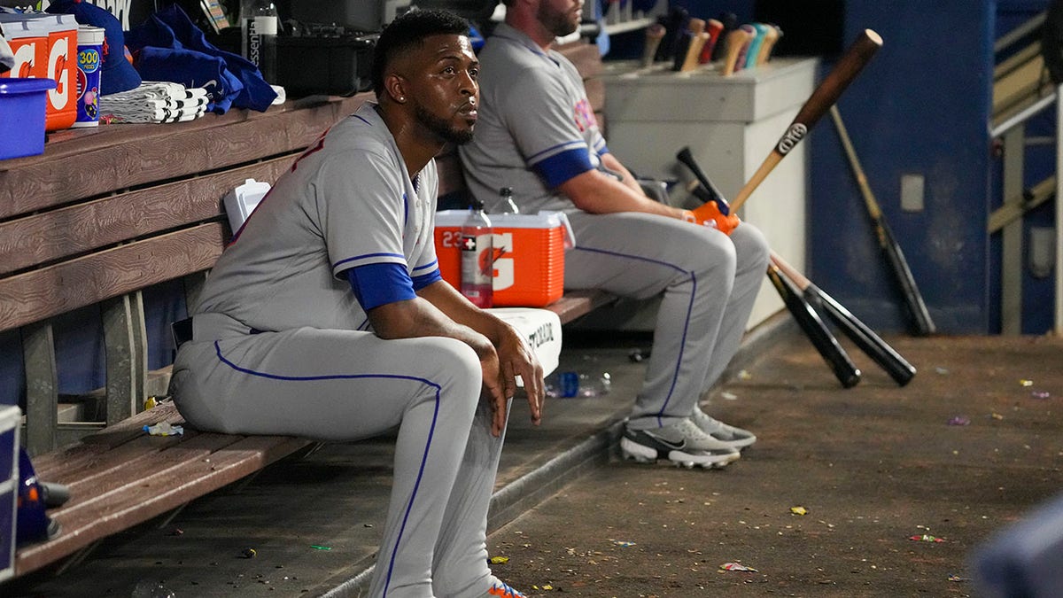 Joely Rodriguez of the Mets sits in the dugout