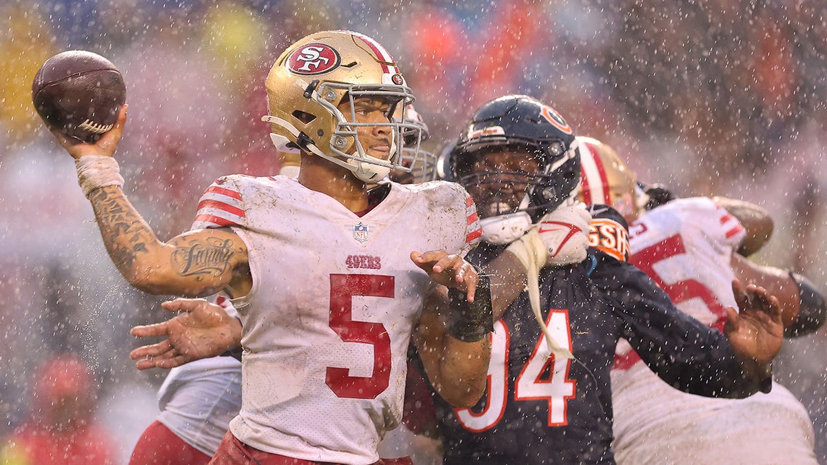 Quarterback Trey Lance of the San Francisco 49ers celebrates with