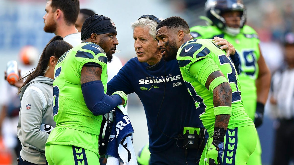 Jamal Adams and Pete Carroll talk during Monday Night Football