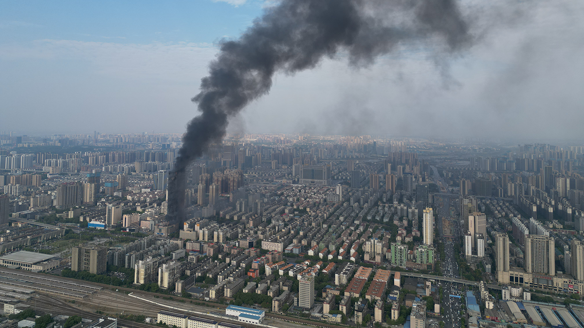 chinese skyscraper engulfed in flames september 16, 2022