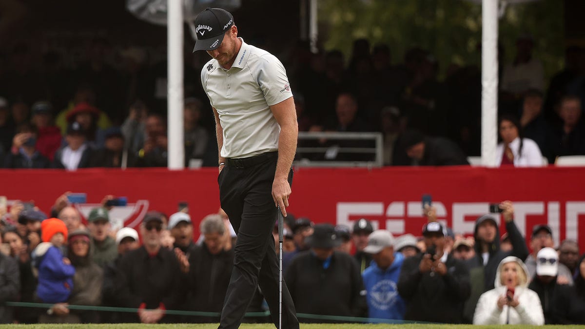 Danny Willett reacts to a missed putt