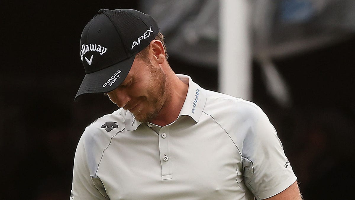 Danny Willett reacts to a missed putt