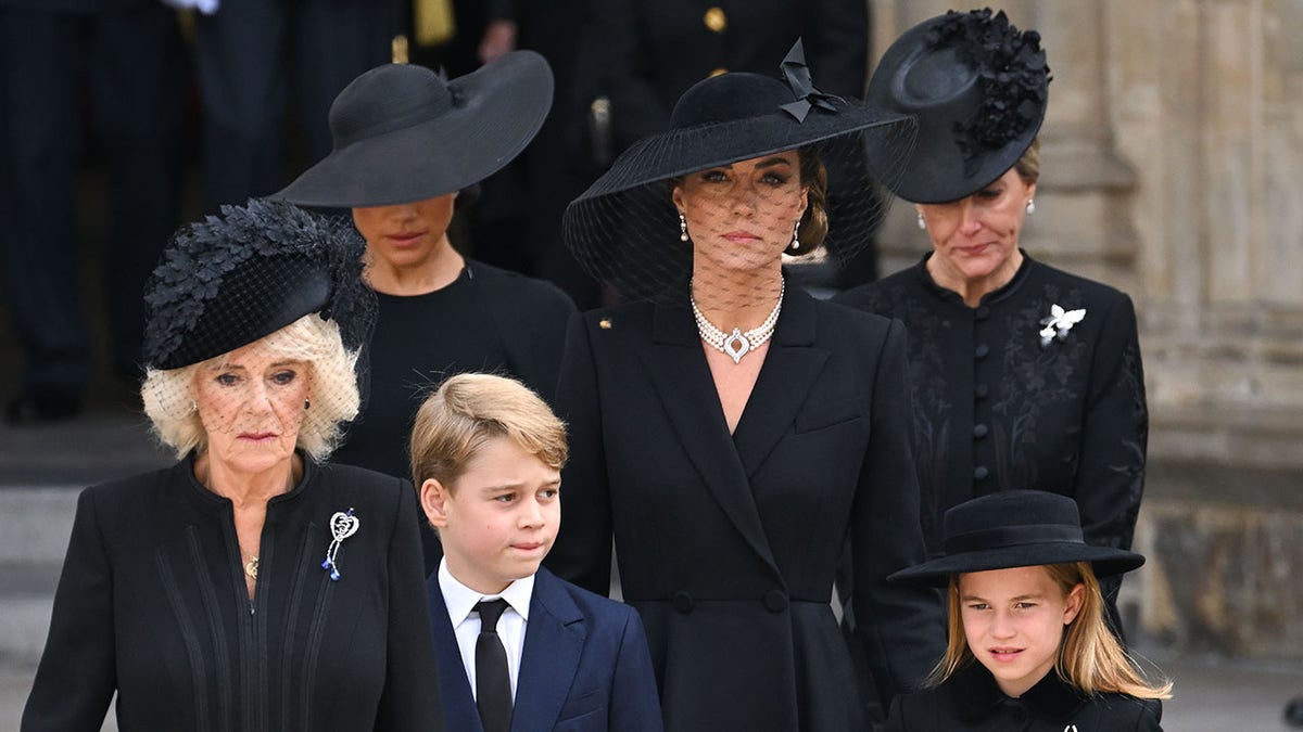 George and Charlotte at the funeral of Queen Elizabeth II with the older members of their family.