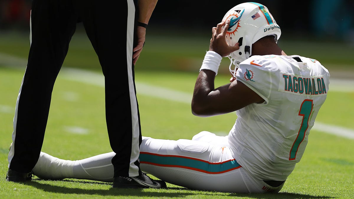 Tua lying on turf