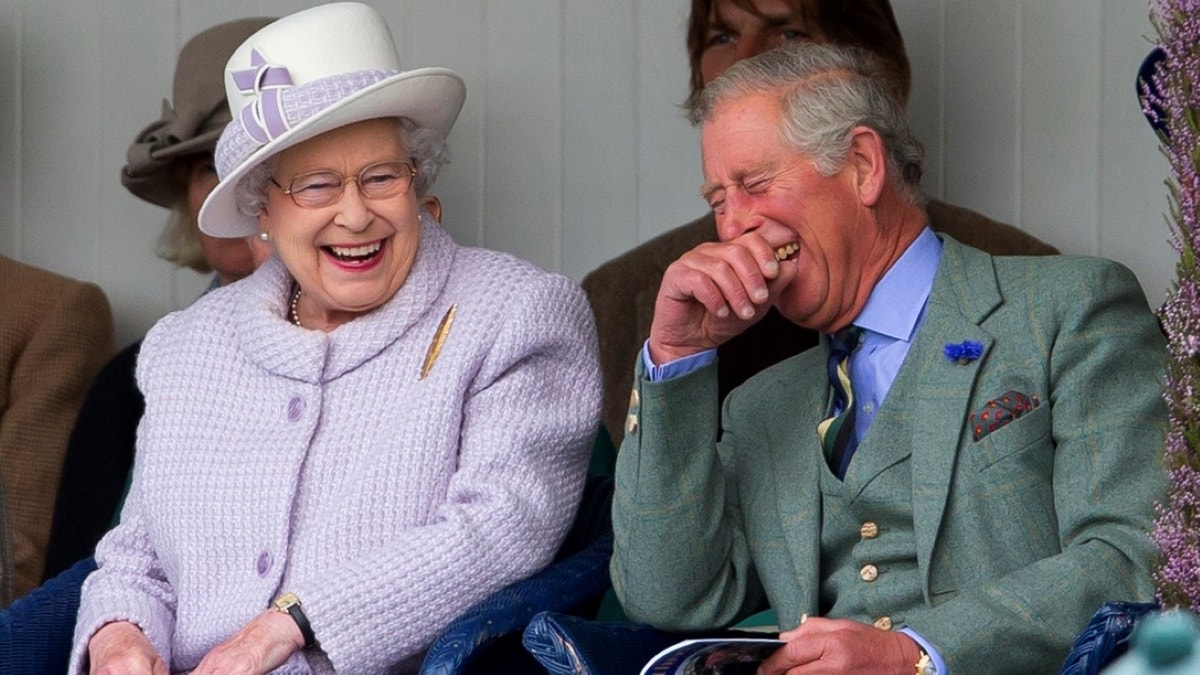 Queen Elizabeth laughing with her son Charles